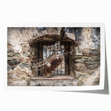 Rolled print of a Central American scenery featuring vibrant floral elements and lush greenery.