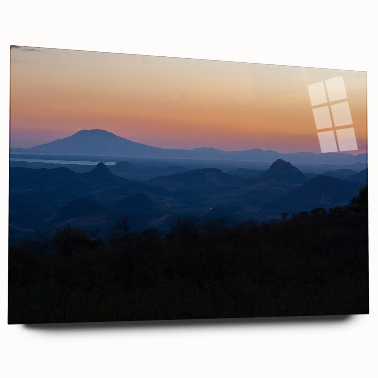Large abstract wall art of a Central American landscape in vibrant greens and blues on acrylic glass.