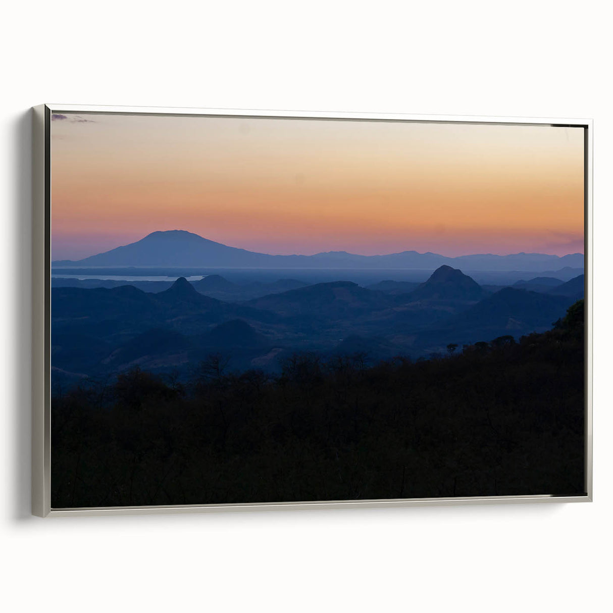Framed canvas depicting a vintage-style landscape art painting of a colorful Honduran scenery.