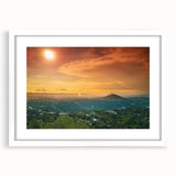 Abstract art print of a colorful Central American landscape on a white framed canvas, ideal for dining room decor.