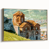 Framed canvas of a vintage-style Albanian landscape in muted gold and black tones, ideal for bedroom wall art.