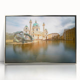 Large art print of a serene Austrian landscape in muted greens and blues, framed in silver acrylic.