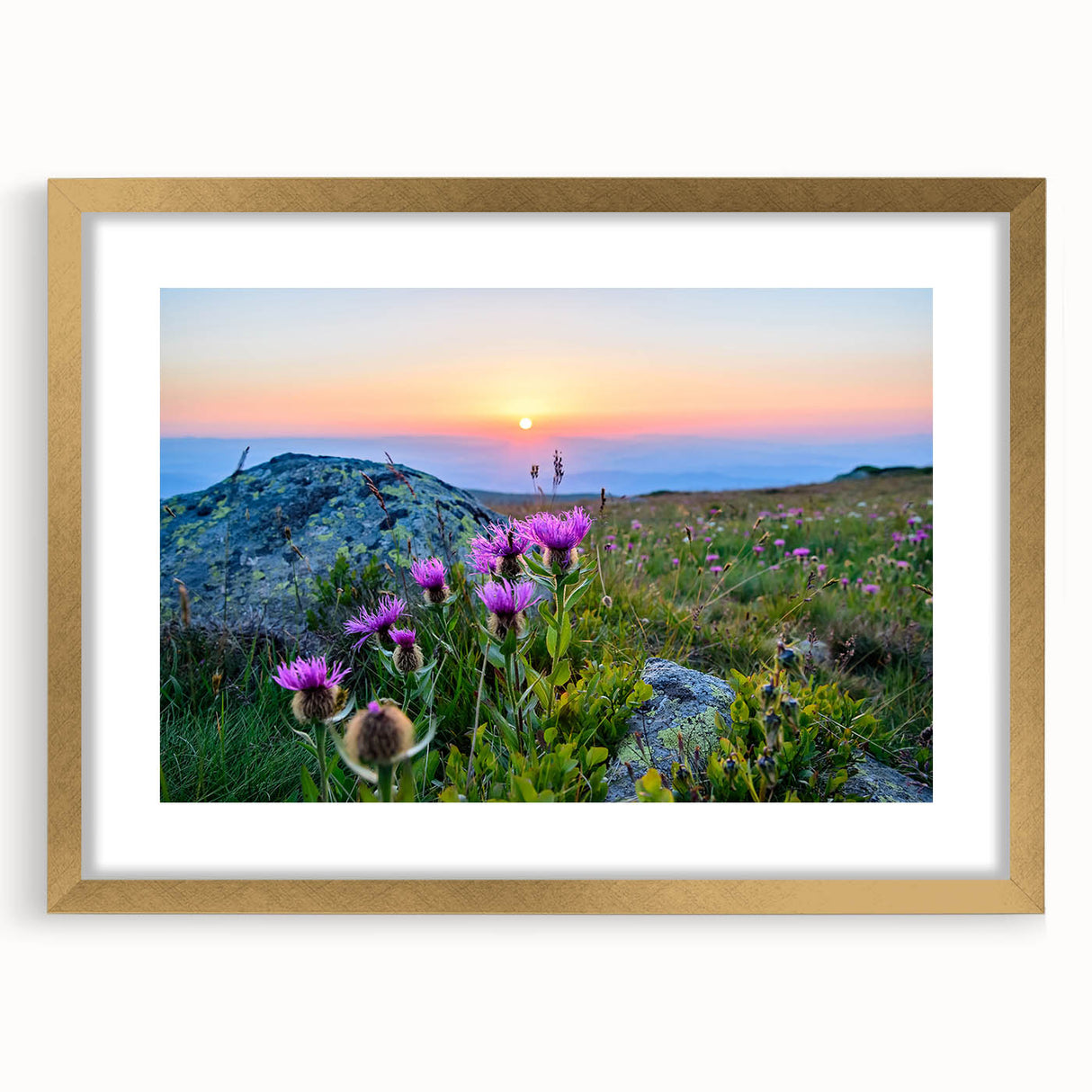Abstract art print of a European scenery in muted gold and green tones, framed with a gold mat, ideal for dining room decor.