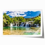 Rolled print of a Croatian landscape with vibrant greenery and a coastal town, ideal for dining room wall art.