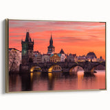 Framed canvas of Prague landscape in vintage poster style, featuring muted black and gold tones, ideal for bedroom wall art.
