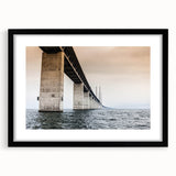 Abstract art print featuring vibrant, colorful textures of a European scenery on a large framed canvas.