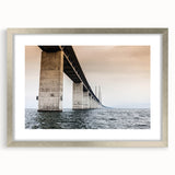 Extra large abstract art print of a European scenery in muted earth tones, framed in silver, ideal for living room decor.