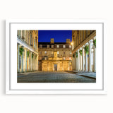 Textured abstract art print of a European landscape in muted earth tones, framed with a white mat, ideal for bedroom art.