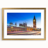 Abstract art print of Big Ben in muted gold and black tones on a framed canvas, suitable for dining room decor.