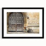 Extra large abstract art print of Oxford scenery in vibrant colors on a textured canvas, framed in black.