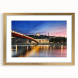Abstract art print of Lyon cityscape in muted gold and blue tones on a framed mat, suitable for dining room decor.