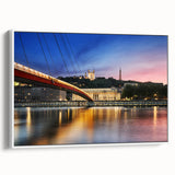 Vintage poster art of Lyon, France in vibrant colors on a large framed canvas, ideal for living room decor.