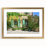 Abstract art print of a Provence landscape in muted earth tones on a framed canvas, suitable for dining room decor.