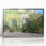 Large art print of a Provence, France scenery in muted earth tones on a silver-framed acrylic.