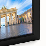 Extra large black wall art featuring a textured Berlin cityscape, with colorful accents, on a framed canvas.