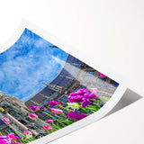 Extra large wall art featuring line art flowers in muted pastel shades on a rolled canvas, ideal for large living room decor.