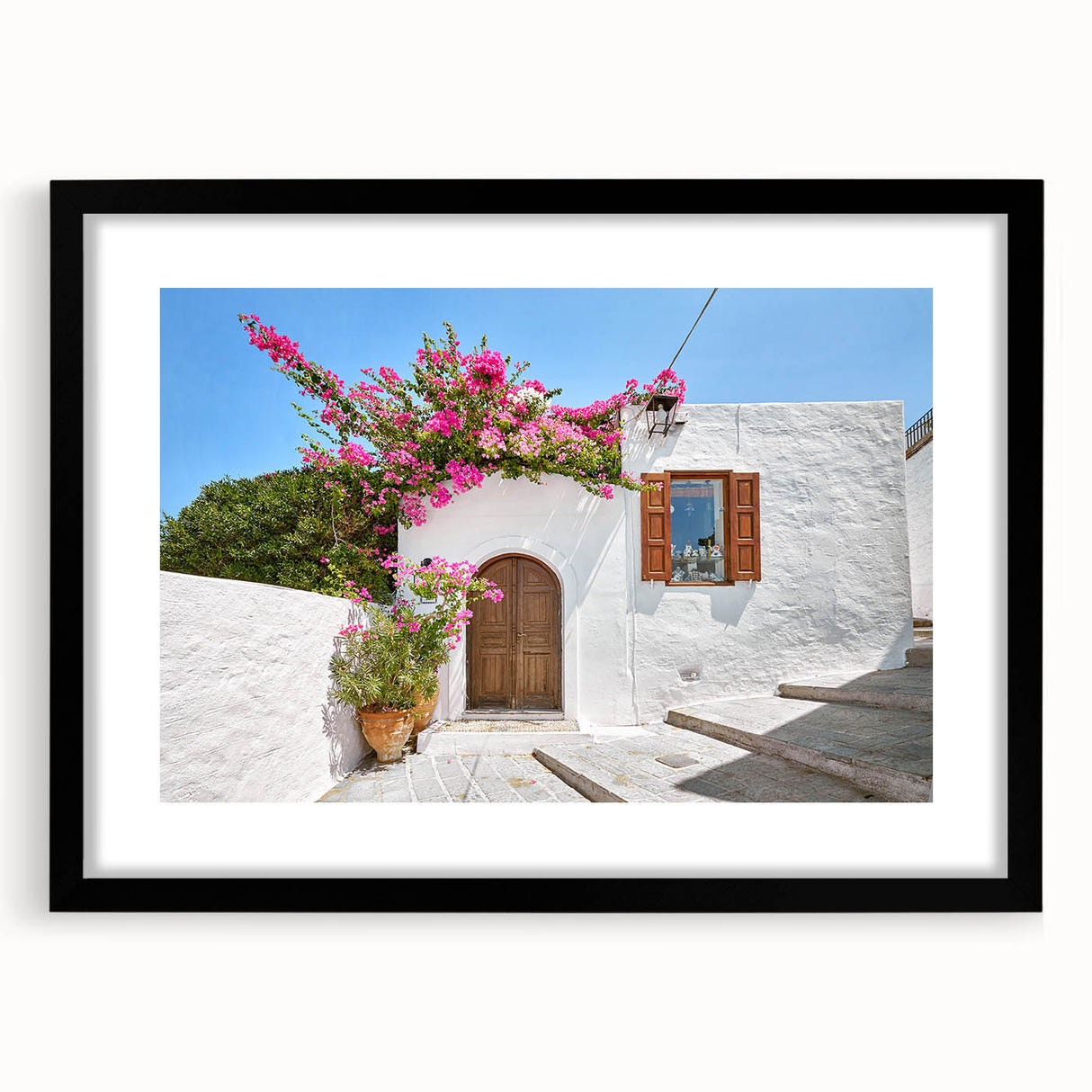 Extra large colorful art print of abstract Rhodes scenery in vibrant hues on textured canvas, framed in black.