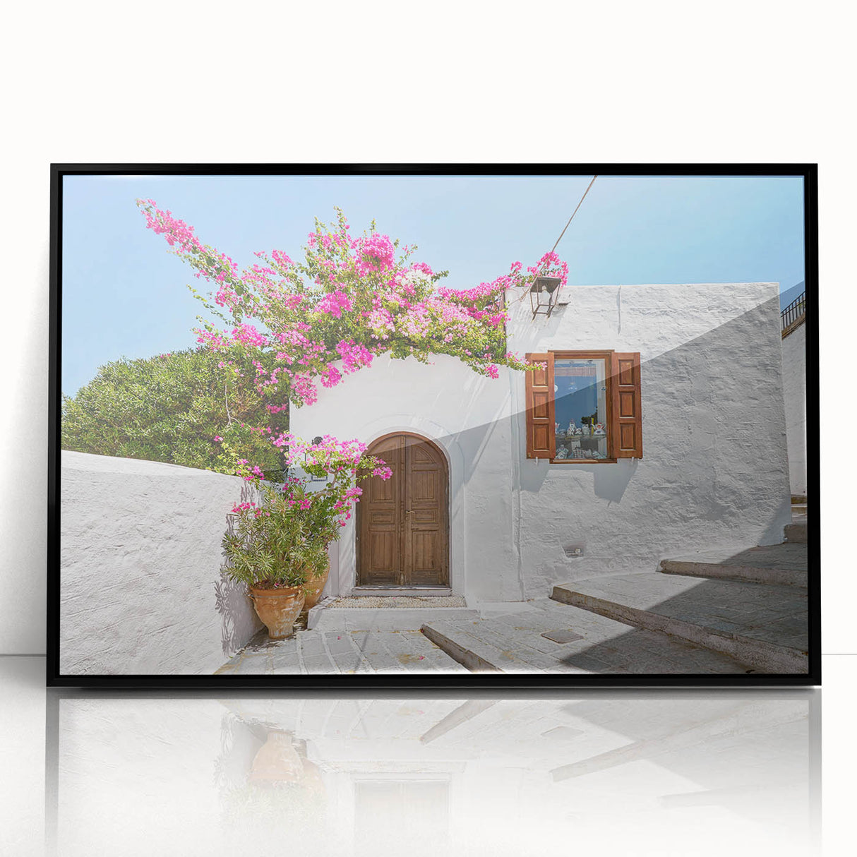Large abstract wall art depicting a European scenery in Rhodes, Greece, in muted earthy tones, framed in black acrylic.