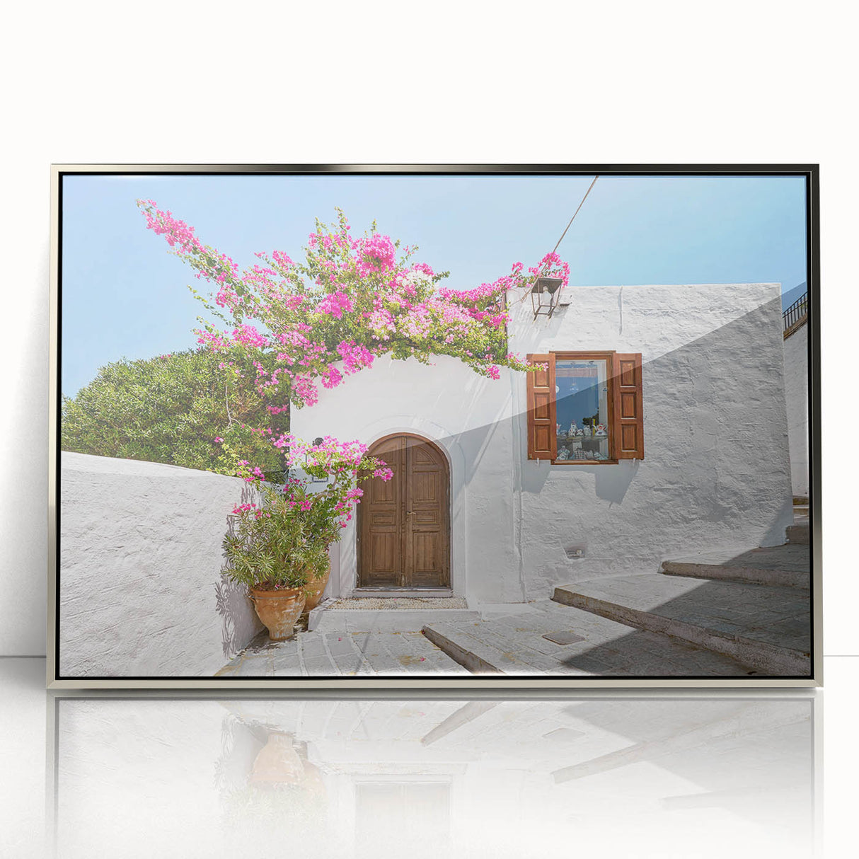 Large art print of Rhodes, Greece in muted blue and white tones on silver-framed acrylic, ideal for modern art wall decor.