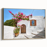 Framed canvas featuring a vintage landscape painting of Rhodes, Greece, in muted gold and black tones.