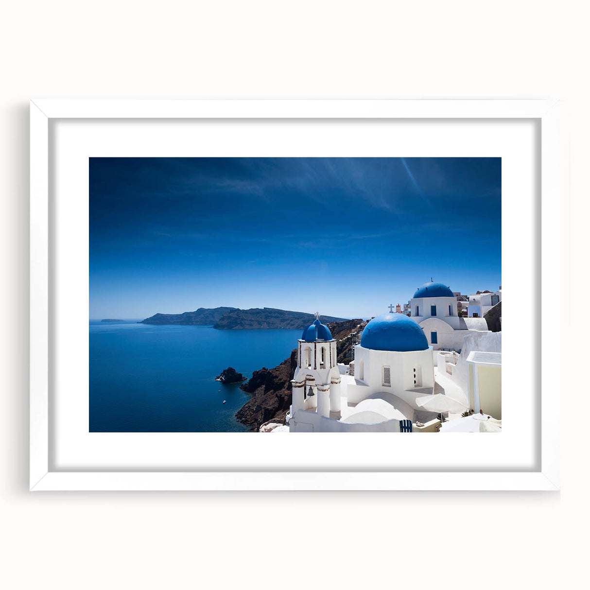 Textured art print of Santorini with abstract blue and white tones on a framed canvas, ideal for bedroom art.