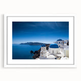 Textured art print of Santorini with abstract blue and white tones on a framed canvas, ideal for bedroom art.