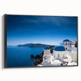 Black and white framed canvas of Santorini landscape, ideal for bedroom wall decor.