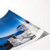 Extra large rolled print of a Santorini landscape with blue and white tones, ideal for large living room wall art.