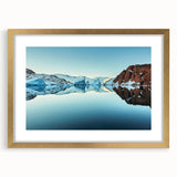 Abstract art print of Greenland scenery in muted green and blue tones, framed in gold, suitable for dining room decor.