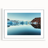 Textured abstract art print of Greenland scenery in muted green and blue tones, framed with a white mat.