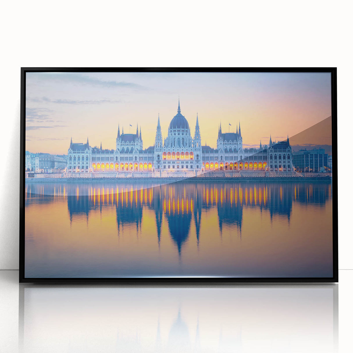 Large abstract wall art depicting a European cityscape in muted gray tones on a framed acrylic.