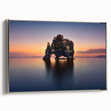 Framed canvas featuring a vintage-style landscape painting of an Icelandic scenery with vivid colors and black borders.