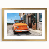 Abstract art print of Amalfi Coast in muted blue and white tones, framed in gold, suitable for dining room decor.