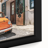 Black framed canvas of the Amalfi Coast with colorful, textured art, ideal for extra large wall art in a living room.