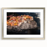 Extra large framed wall art depicting the colorful coastal village of Cinque Terre in Italy, ideal for living room decor.