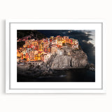 Textured art print of Cinque Terre with vibrant coastal colors on a framed white mat, suitable for bedroom decor.