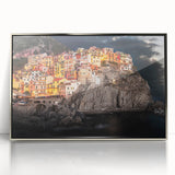 Framed acrylic print of Cinque Terre with vibrant coastal colors, ideal for nursery wall art or modern decor.