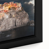 Framed canvas depicting the colorful Cinque Terre coastline with textured cliffs and vibrant homes.