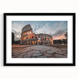 Extra large textured abstract art print of the Colosseum in vibrant colors, framed in black, ideal for living room decor.