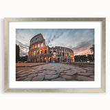 Extra large wall art featuring an abstract print of the Colosseum in muted earth tones, framed in silver.