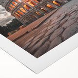 Art deco poster of the Colosseum in muted earth tones on rolled canvas, suitable for dining room decor.