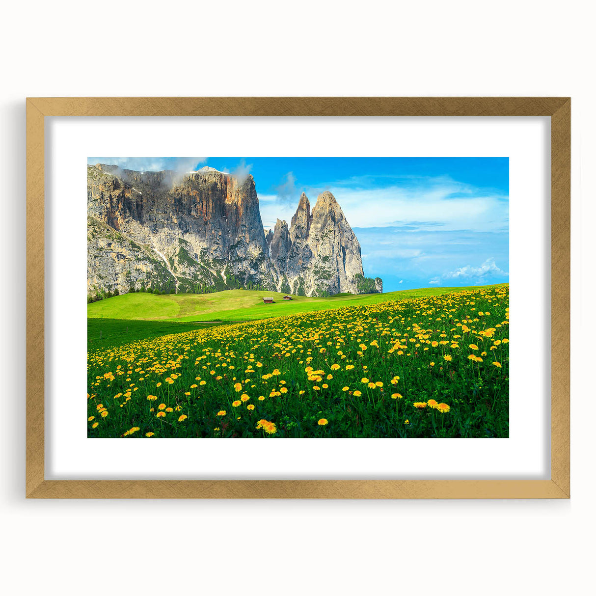 Abstract art print of the Dolomites in muted earth tones on a gold-framed canvas, suitable for dining room decor.