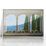 Mid-century modernist art of Lake Como with muted blue and green tones on a framed acrylic, ideal for nursery wall decor.