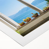 Art deco poster of Lake Como with muted blue and green tones on a rolled canvas, suitable for dining room decor.