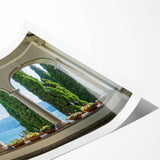 Extra large wall art of Lake Como with floral and line art flowers in soft pastel colors on a rolled print.