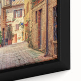 Framed canvas of a textured Tuscan landscape in black with vibrant, colorful accents, ideal for living room decor.
