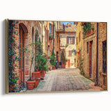 Framed canvas featuring a vintage-style Tuscan landscape in muted gold and black tones, ideal for bedroom wall decor.