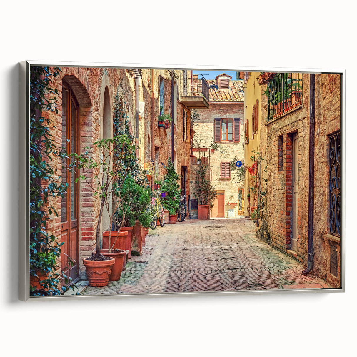 Framed canvas landscape art painting featuring the rolling hills of Tuscany in muted earth tones.