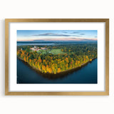 Abstract art print of a European landscape in muted green and blue tones, framed in gold, suitable for dining room decor.