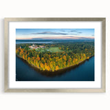 Extra large abstract art print depicting a textured European landscape in muted earth tones, framed in silver.